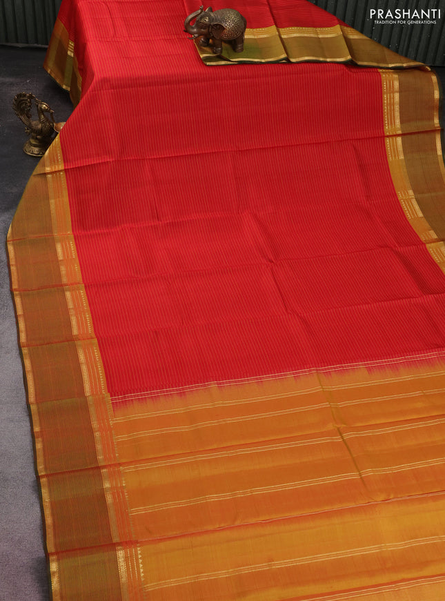 Pure kanchipuram silk saree red and green with stripes pattern and rettapet zari woven border