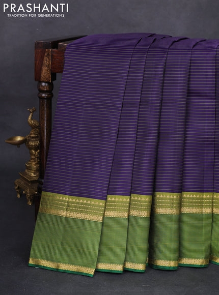 Pure kanchipuram silk saree navy blue and green with stripes pattern and rettapet zari woven border