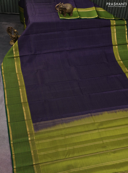 Pure kanchipuram silk saree navy blue and green with stripes pattern and rettapet zari woven border