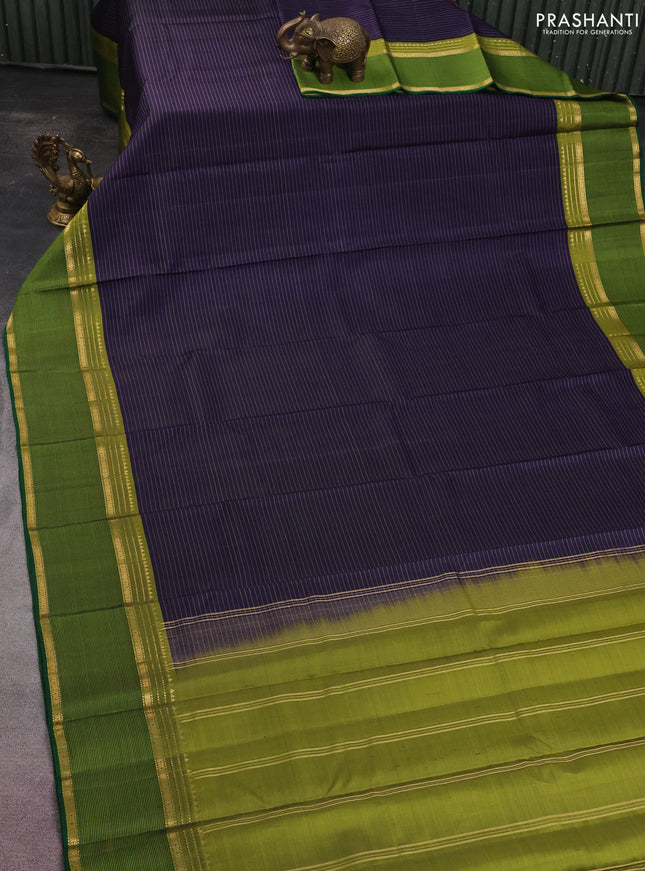Pure kanchipuram silk saree navy blue and green with stripes pattern and rettapet zari woven border