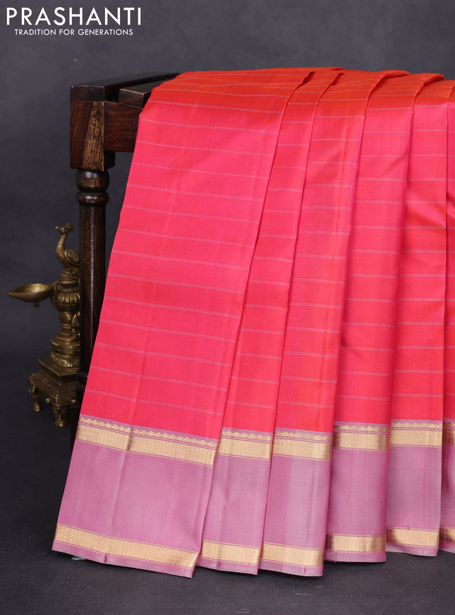Pure kanchipuram silk saree peach pink and pastel pink with stripes pattern and rettapet zari woven border