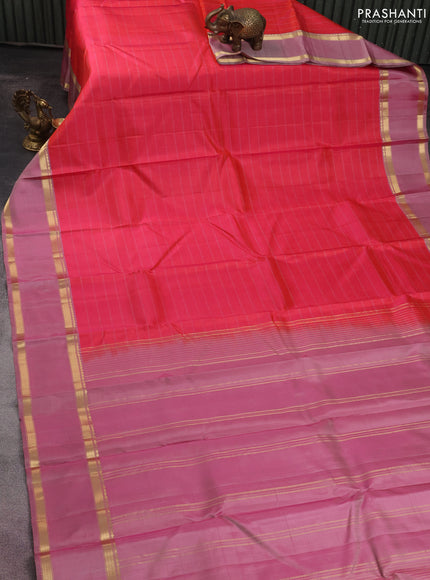 Pure kanchipuram silk saree peach pink and pastel pink with stripes pattern and rettapet zari woven border
