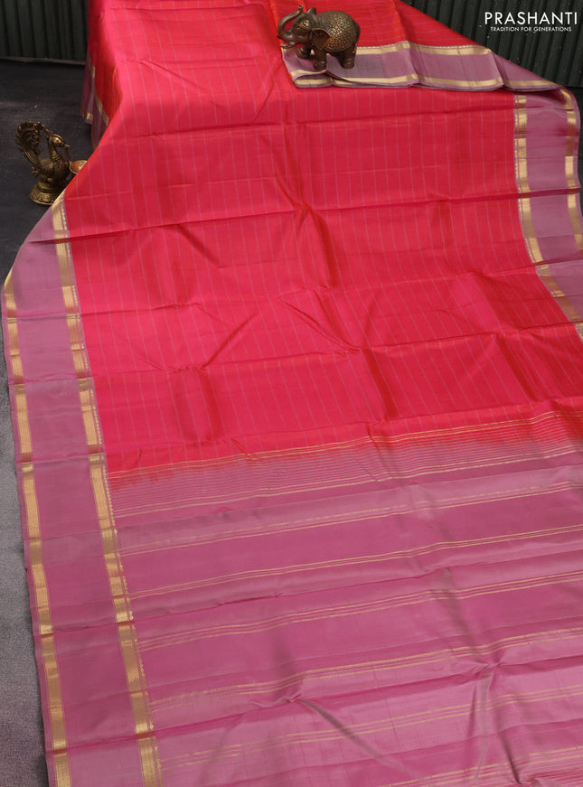 Pure kanchipuram silk saree peach pink and pastel pink with stripes pattern and rettapet zari woven border