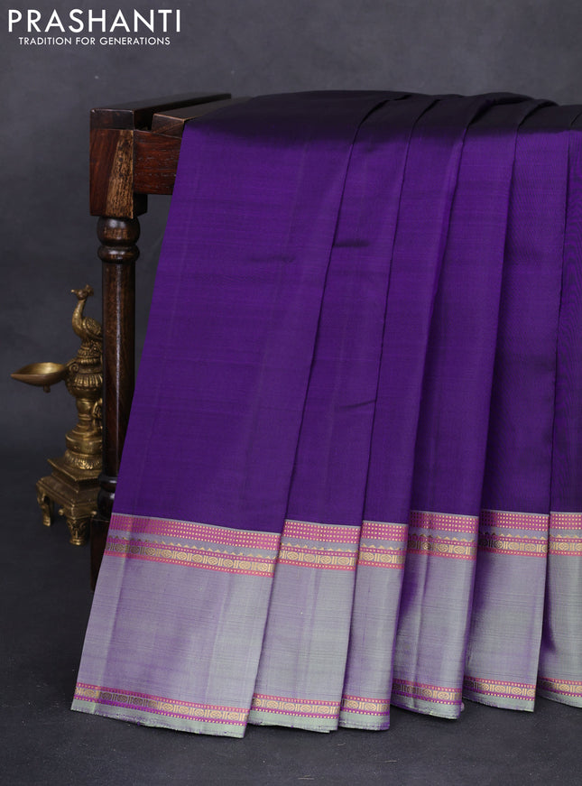 Pure kanchipuram silk saree violet and pastel green with plain body and rettapet zari woven border