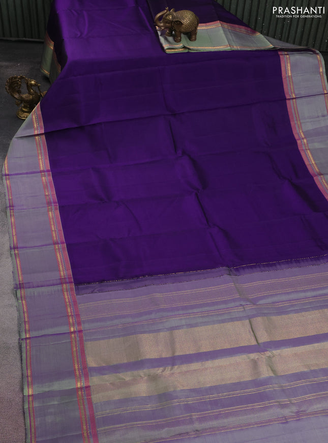 Pure kanchipuram silk saree violet and pastel green with plain body and rettapet zari woven border