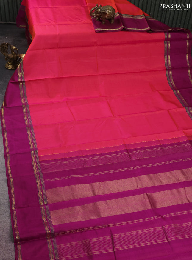 Pure kanchipuram silk saree dual shade pinkish orange and magenta pink with plain body and rettapet zari woven border