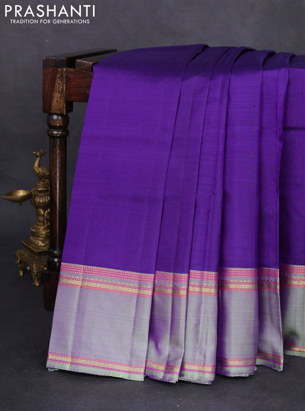 Pure kanchipuram silk saree violet and pastel green with plain body and rettapet zari woven border