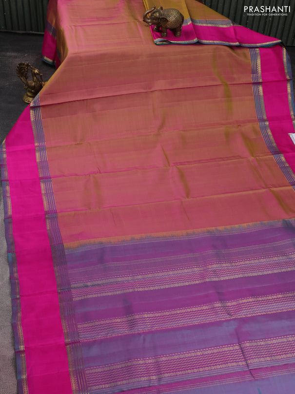 Pure kanchipuram silk saree dual shade of greenish pink and peacock green with plain body and rettapet zari woven border