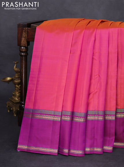 Pure kanchipuram silk saree dual shade of pinkish orange and purple with plain body and rettapet zari woven border