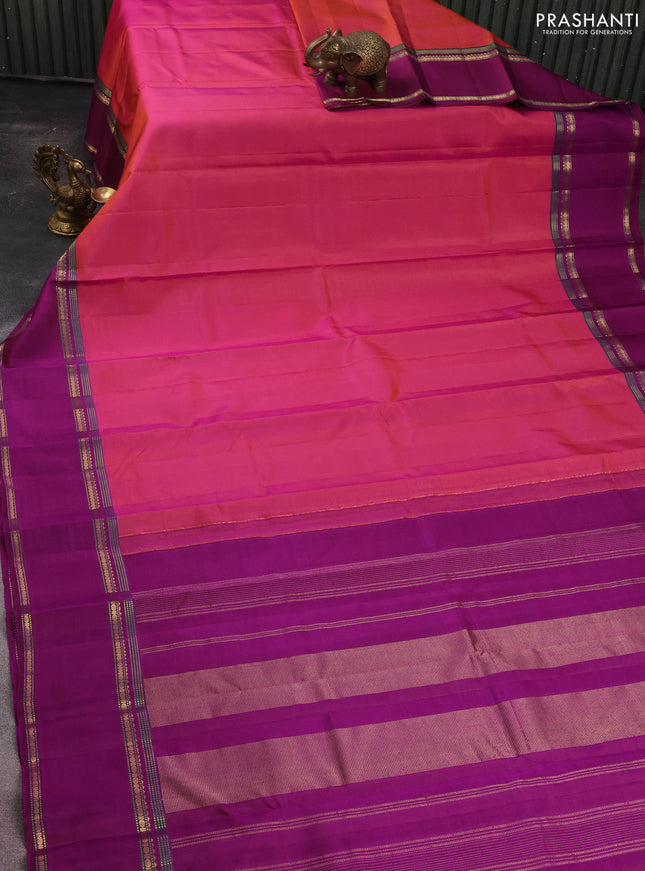 Pure kanchipuram silk saree dual shade of pinkish orange and purple with plain body and rettapet zari woven border