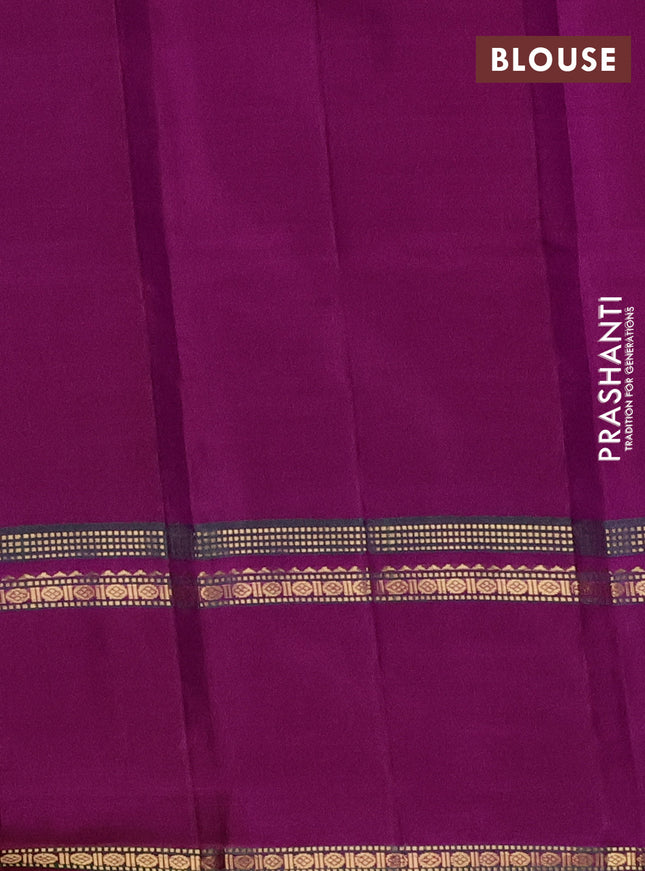 Pure kanchipuram silk saree dual shade of pinkish orange and purple with plain body and rettapet zari woven border