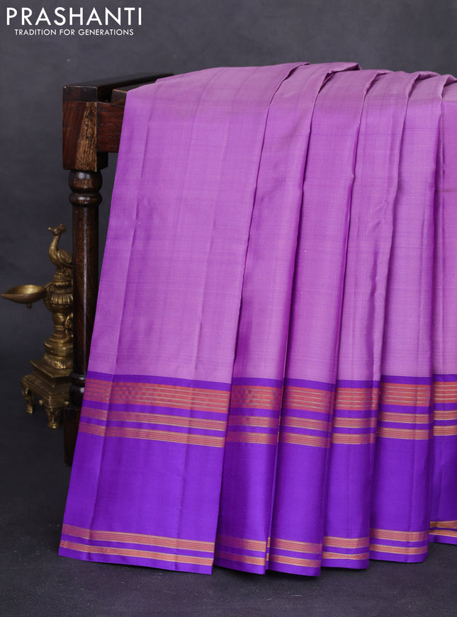 Pure kanchipuram silk saree lavender and blue with plain body and rettapet zari woven border