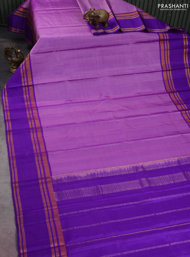 Pure kanchipuram silk saree lavender and blue with plain body and rettapet zari woven border