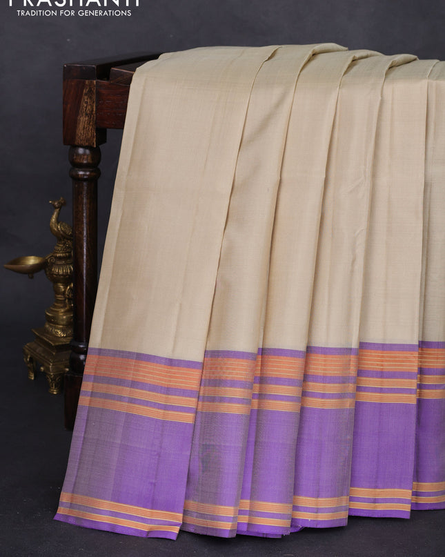 Pure kanchipuram silk saree cream and violet with plain body and rettapet zari woven border