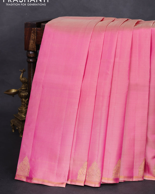 Pure kanchipuram silk saree dual shade of pastel pink with plain body and zari woven butta border