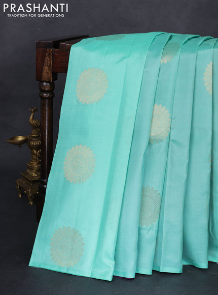 Pure kanchipuram partly silk saree teal green and red purple with zari woven buttas in borderless style