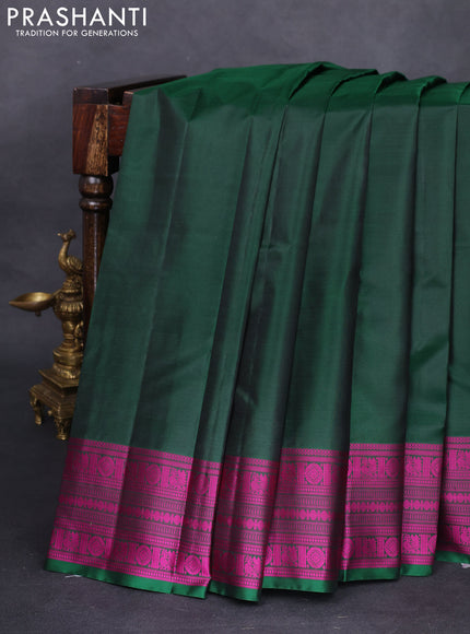 Pure kanchipuram silk saree dark green with plain body and thread woven border