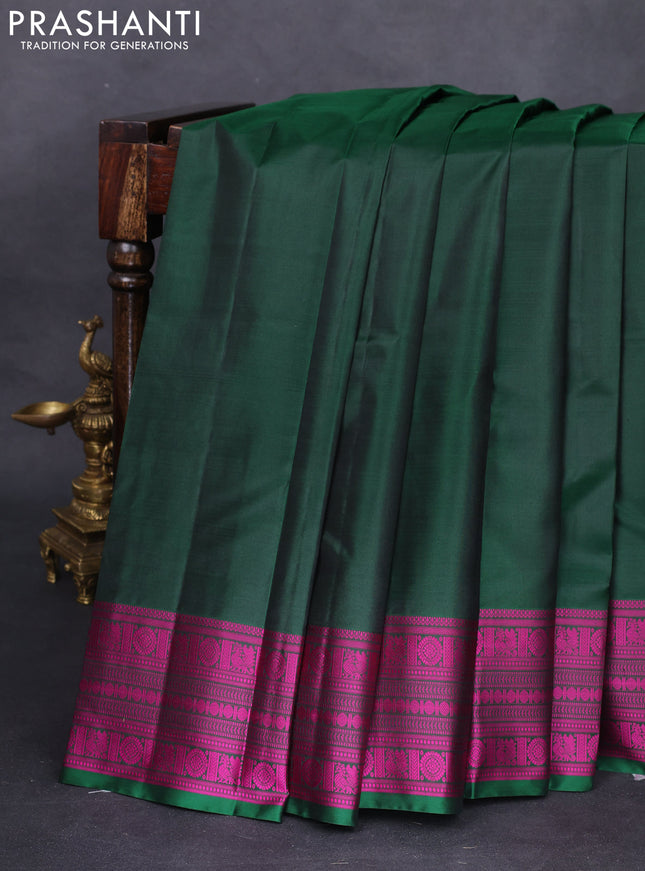 Pure kanchipuram silk saree dark green with plain body and thread woven border
