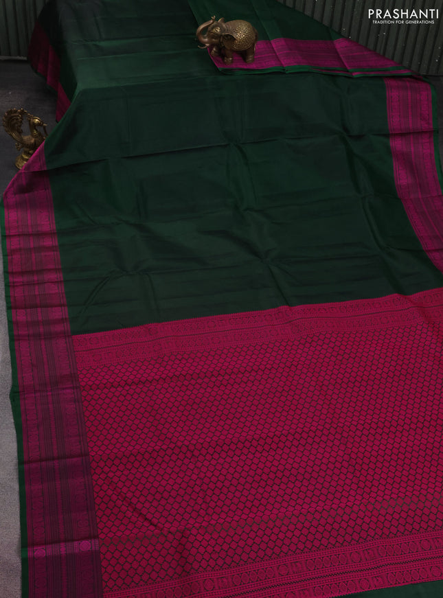 Pure kanchipuram silk saree dark green with plain body and thread woven border