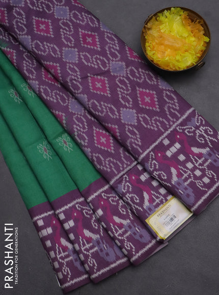 Semi sambalpuri silk saree green and purple with allover ikat buttas and thread woven border