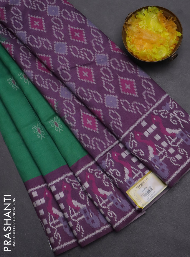 Semi sambalpuri silk saree green and purple with allover ikat buttas and thread woven border