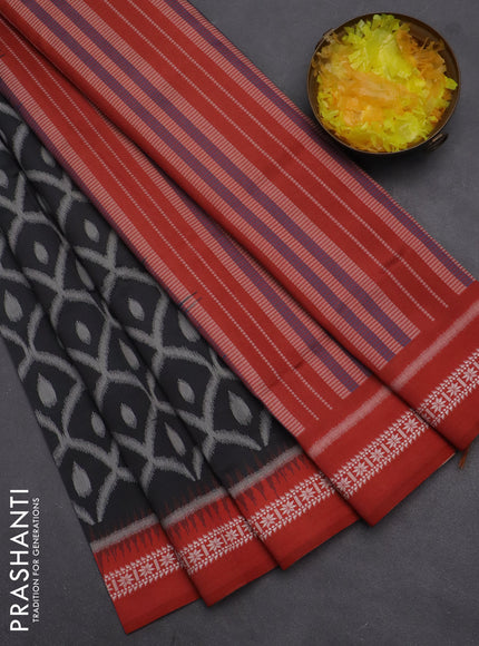 Semi sambalpuri silk saree black and rustic orange with allover ikat weaves and thread woven border