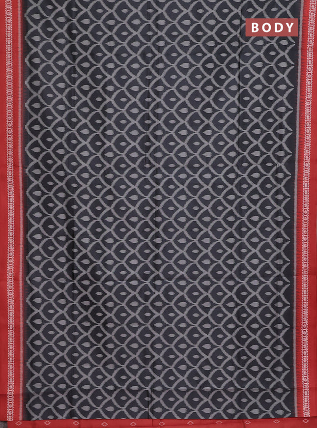 Semi sambalpuri silk saree black and rustic orange with allover ikat weaves and thread woven border