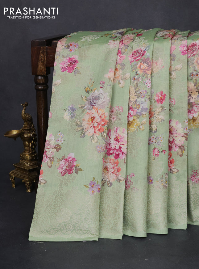 Chiniya silk saree pastel green with allover silver zari buttas & floral digital prints and zari woven border