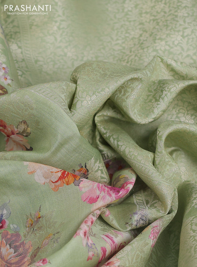 Chiniya silk saree pastel green with allover silver zari buttas & floral digital prints and zari woven border