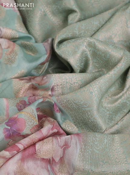 Chiniya silk saree teal blue shade with allover zari buttas & floral digital prints and woven border