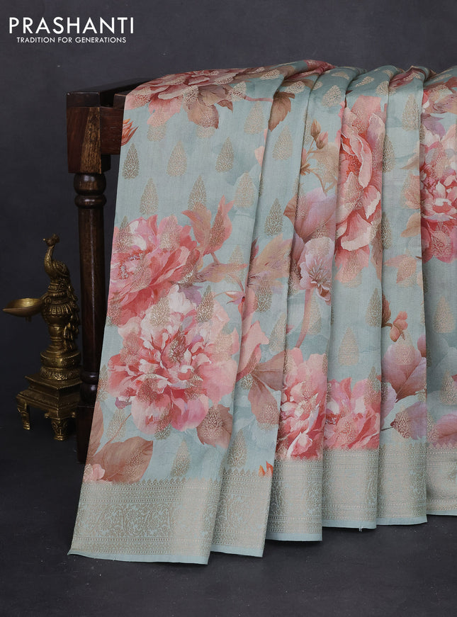 Chiniya silk saree pastel blue with allover zari buttas & floral digital prints and woven border