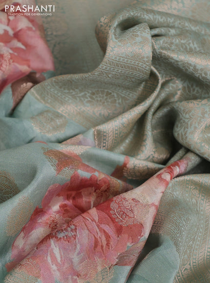 Chiniya silk saree pastel blue with allover zari weaves & floral digital prints and woven border