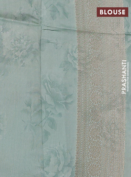 Chiniya silk saree pastel blue with allover zari weaves & floral digital prints and woven border