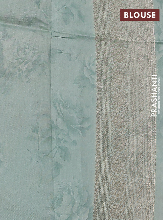Chiniya silk saree pastel blue with allover zari weaves & floral digital prints and woven border