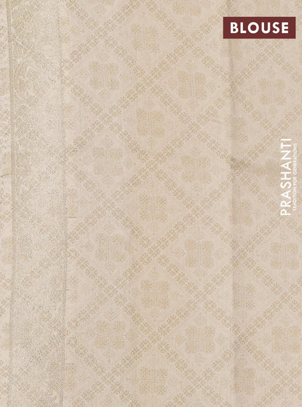 Chiniya silk saree beige with allover zari weaves & floral digital prints and woven border