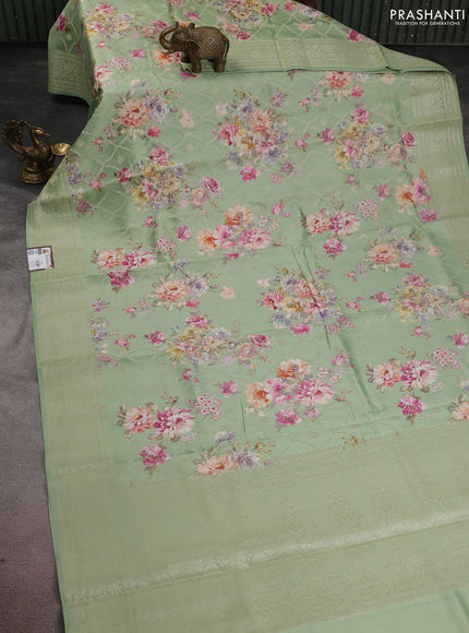 Chiniya silk saree green shade with allover zari weaves & floral digital prints and woven border