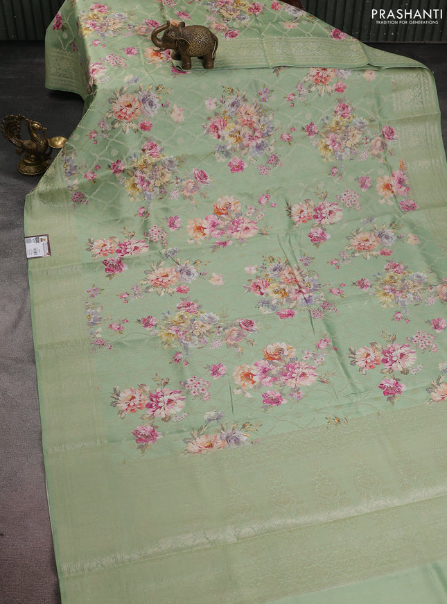 Chiniya silk saree green shade with allover zari weaves & floral digital prints and woven border