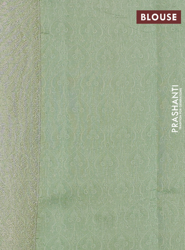 Chiniya silk saree green shade with allover zari weaves & floral digital prints and woven border