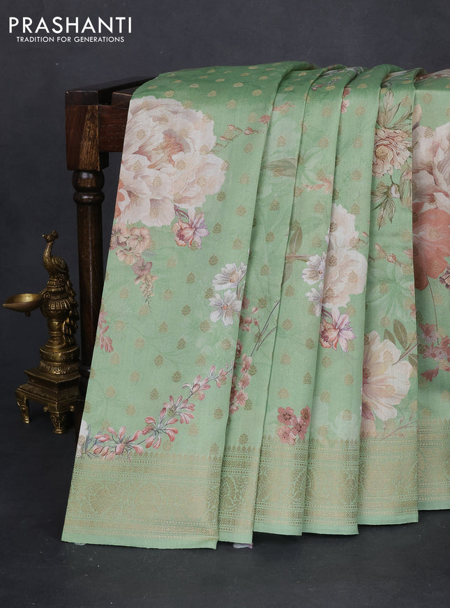 Chiniya silk saree teal green with allover zari buttas & floral digital prints and woven border