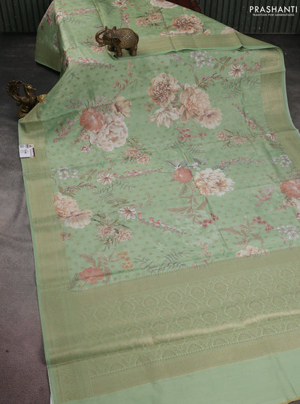 Chiniya silk saree teal green with allover zari buttas & floral digital prints and woven border