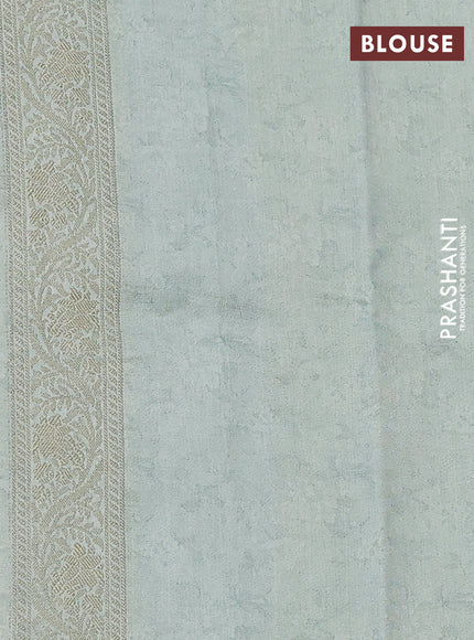 Chiniya silk saree pastel blue shade with allover zari buttas & floral digital prints and woven border
