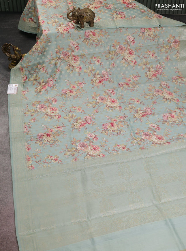 Chiniya silk saree pastel blue with allover zari buttas & floral digital prints and woven border