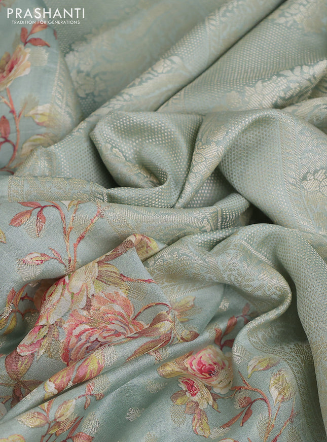 Chiniya silk saree pastel blue with allover zari buttas & floral digital prints and woven border