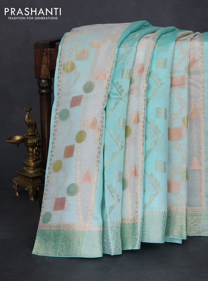 Chiniya silk saree teal blue with allover geometric zari weaves & digital prints and zari woven border