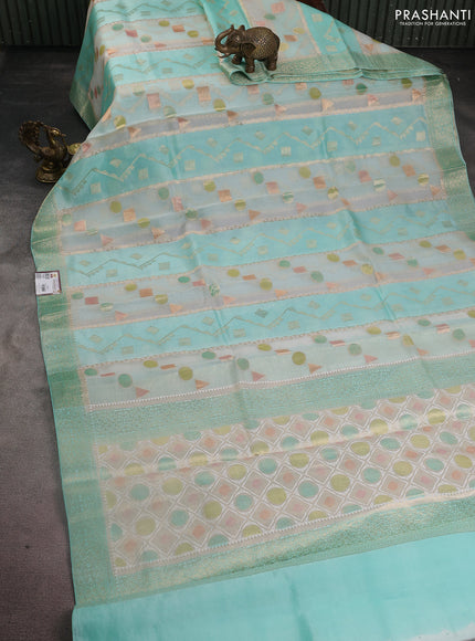 Chiniya silk saree teal blue with allover geometric zari weaves & digital prints and zari woven border