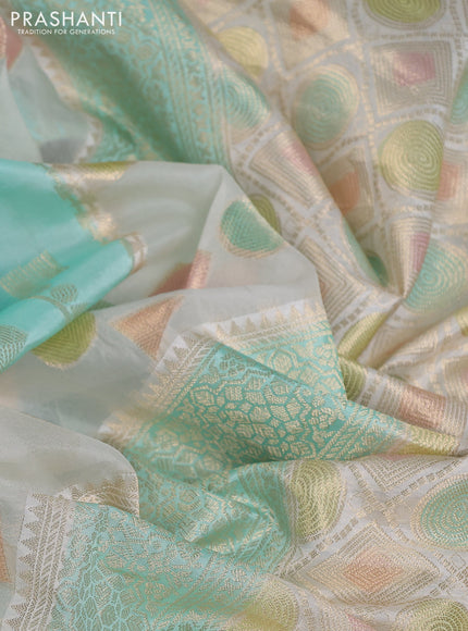 Chiniya silk saree teal blue with allover geometric zari weaves & digital prints and zari woven border