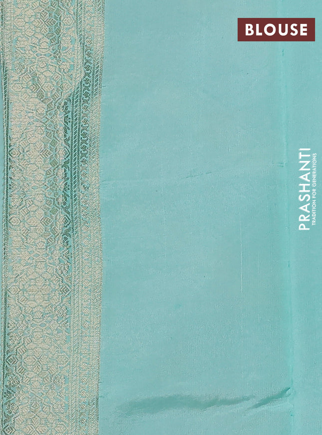 Chiniya silk saree teal blue with allover geometric zari weaves & digital prints and zari woven border