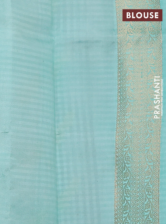 Chiniya silk saree off white and teal blue with allover zari weaves & digital prints and zari woven border