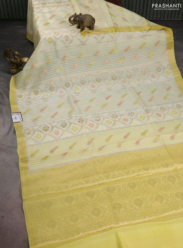 Chiniya silk saree pale yellow and yellow with allover zari weaves & digital prints and zari woven border