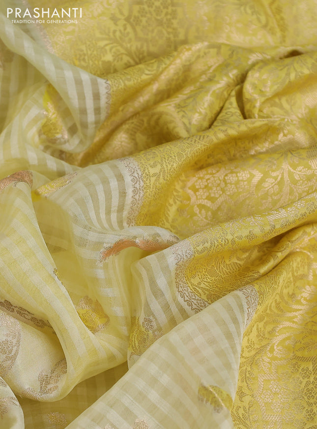 Chiniya silk saree pale yellow and yellow with allover zari weaves & digital prints and zari woven border